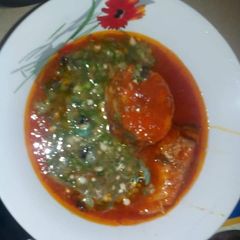 A picture of Okro soup mix with stew.