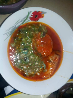 A picture of Okro soup mix with stew.