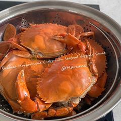 A picture of Steamed Mozambique Crabs with Seafood dipping Sauce.