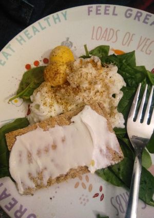 A picture of Poached egg with spinach.