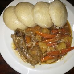 A picture of Steam bread and Chicken stew.