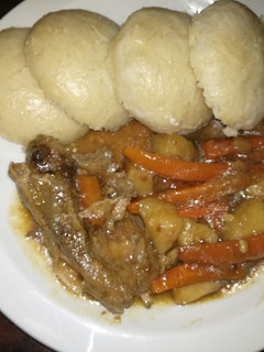 A picture of Steam bread and Chicken stew.