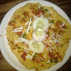 A picture of Masala Papad with Salad.