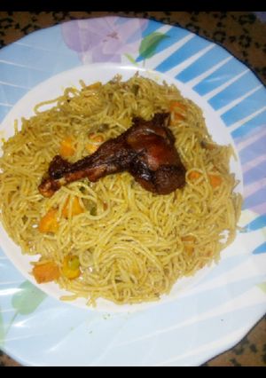A picture of Jollof spaghetti.