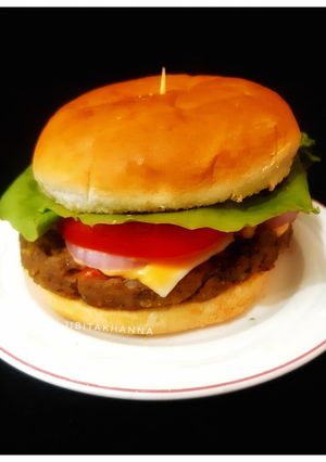 A picture of Raw Banana and Potato Patty Veg Burger.