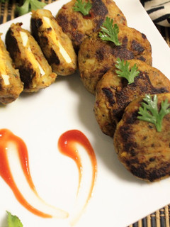 A picture of Egg Stuffed Raw Jackfruit Tikki.