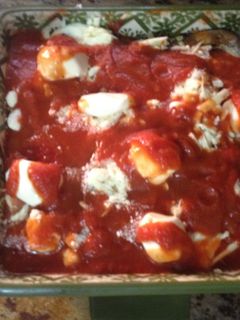 Una foto de Berenjena sin carne a la Parmesana estilo Dominicano