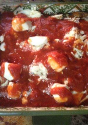 Una foto de Berenjena sin carne a la Parmesana estilo Dominicano