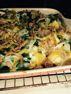 Una foto de Vegetales Gratinados al vapor cubiertos de quesos manchego y cheddar