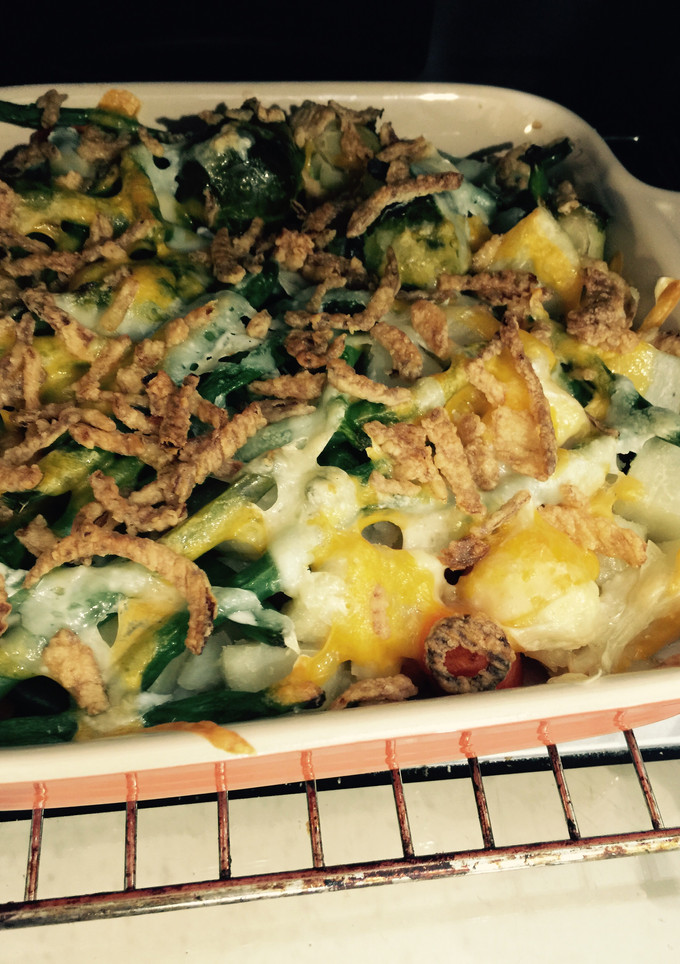 Una foto de Vegetales Gratinados al vapor cubiertos de quesos manchego y cheddar