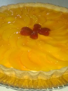 Una foto de Tarta de Duraznos con Crema 