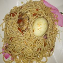 Spaghetti jollof with sardine and egg A picture of Spaghetti jollof with sardine and egg.