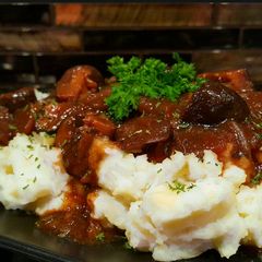 A picture of Mike's Savory Southern Onion Mushroom Gravy.