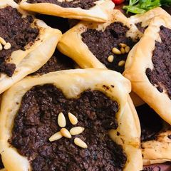 Tripolitan meat pies (lahmeh baajin) A picture of Tripolitan meat pies (lahmeh baajin).
