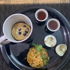 A picture of Chinese poha with bluberry mug pancake boiled egg and black coffee with tips for boiling eggs.