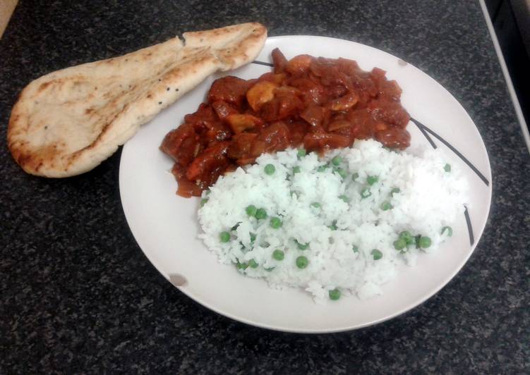 5 Easy Dinner spicy chicken curry, nan bread with rice &amp; peas