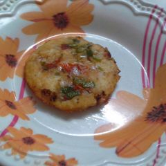 A picture of Onion Uthappam-Party Special.