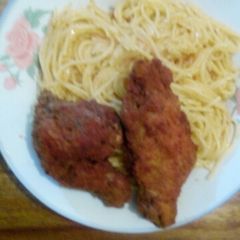 A picture of Coated chicken with noddles.