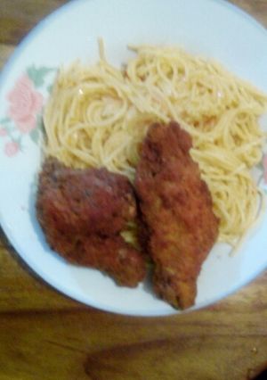 A picture of Coated chicken with noddles.