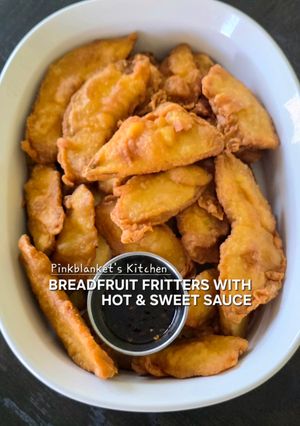 A picture of Breadfruit fritters with hot & sweet sauce.
