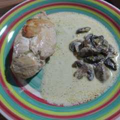 Una foto de Pollo con hongos