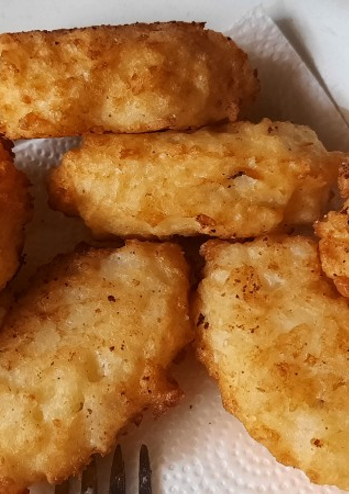 Una foto de Croquetas de arroz rellenas