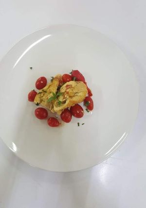 Una foto de Pechugas rellenas con albahaca y jitomate