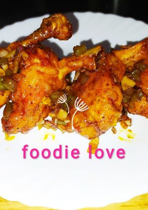 A picture of Indo Chinese Saucy Lollipop chicken.