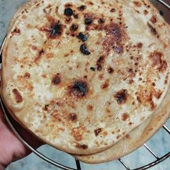 A picture of Cheeni paratha.