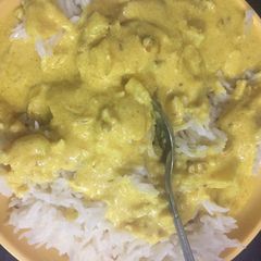 A picture of White rice with kadhi.
