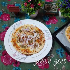 Thin Crust Onion and Olive Pizza A picture of Thin Crust Onion and Olive Pizza.