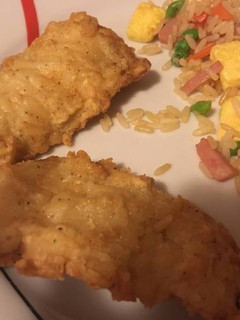 Una foto de Filete de pescado con rebozado marroquí