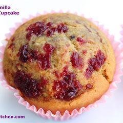 A picture of Eggless Vanilla Plum Jam Cup cake.