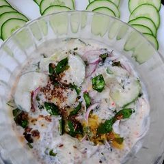 A picture of Cucumber & Onion Salad with chia seeds.