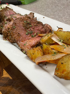 A picture of Roasted Garlic Mint Lamb Leg.