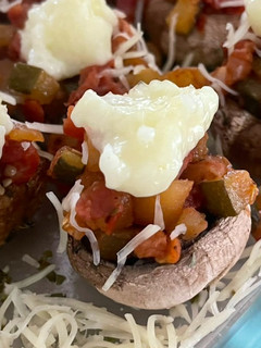 Una foto de Champis rellenos con alioli gratén