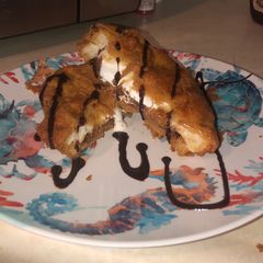 A picture of Deep fried Nutella s’mores sandwich.