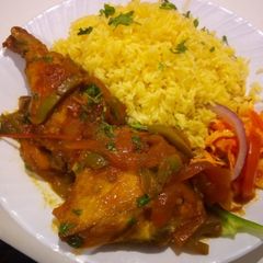 A picture of Spiced chicken with rice.