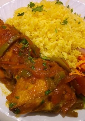 A picture of Spiced chicken with rice.