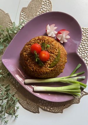 A picture of Bulgur with Tomatoes and Pomegranate Molasses.