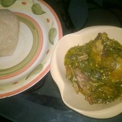 A picture of Ogbono soup with white garri.