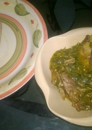 A picture of Ogbono soup with white garri.