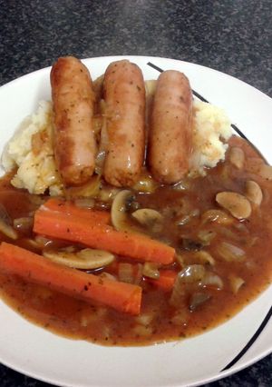 A picture of sausage cassarole with creamy mash.