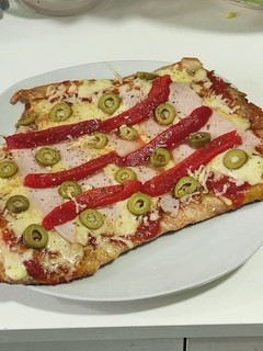 Una foto de Malaya a la pizza
