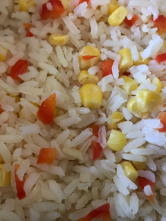 Una foto de Arroz con choclo y pimiento