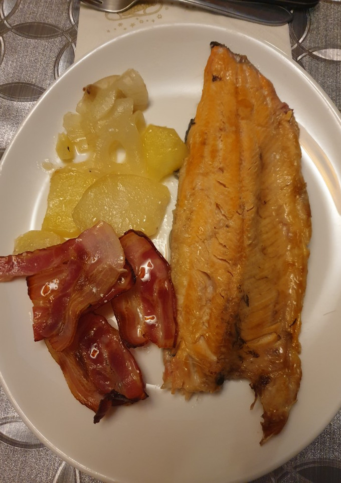 Una foto de Truchas al horno con bacon