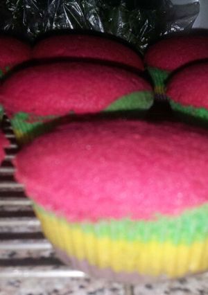 A picture of Rainbow cupcakes.
