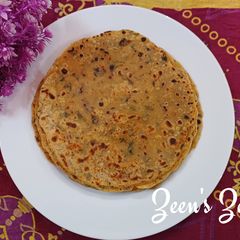 A picture of Maize and Wheat Rotis with Fenugreek Greens.