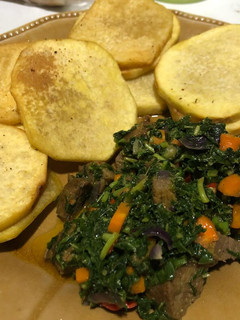 A picture of Fried yam and vegetables.