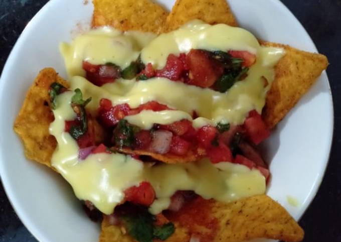 Simple Way to Make Ultimate Nachos with Salsa sauce and cheese dip